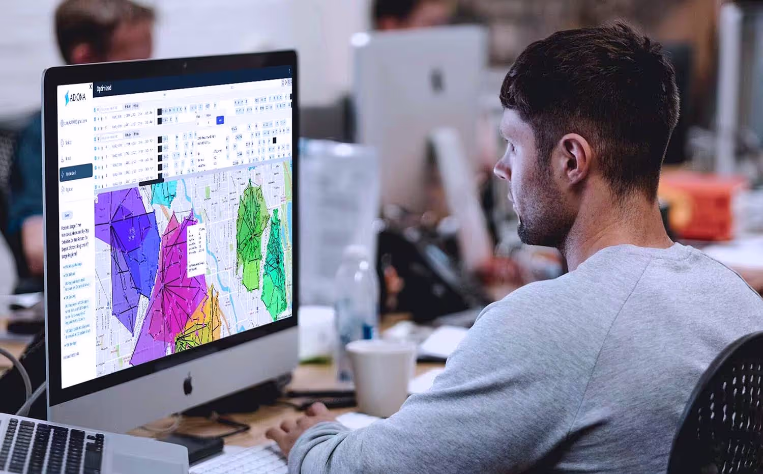 Adiona Tech operator using software on desktop to simulate and manage fleet operations